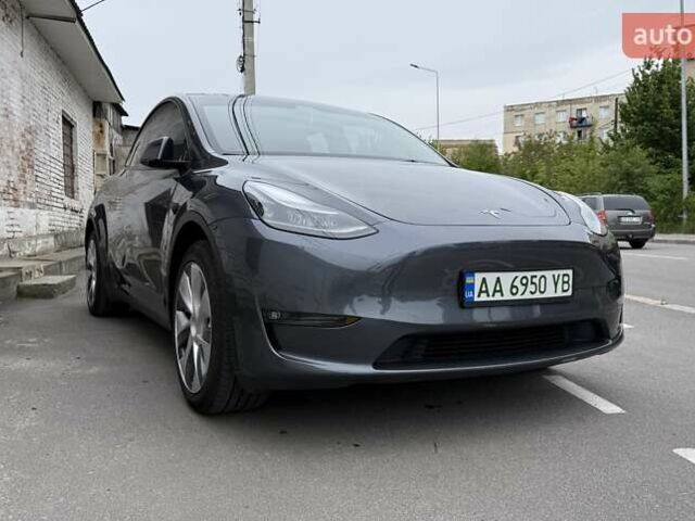 Серый Тесла Model Y, объемом двигателя 0 л и пробегом 25 тыс. км за 29000 $, фото 1 на Automoto.ua