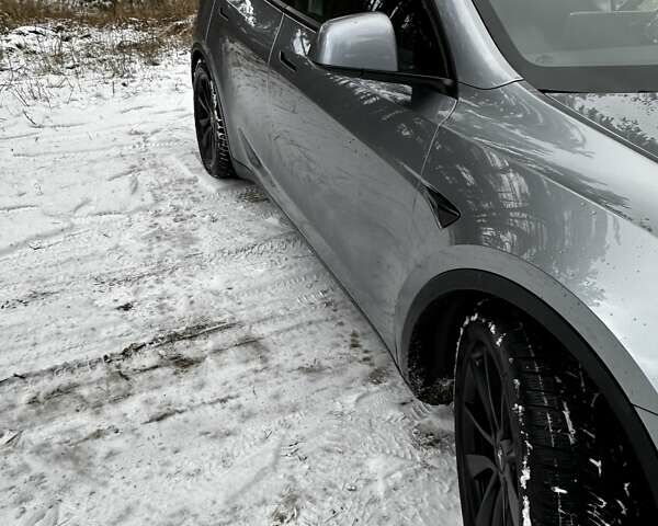 Серый Тесла Model Y, объемом двигателя 0 л и пробегом 54 тыс. км за 48999 $, фото 1 на Automoto.ua