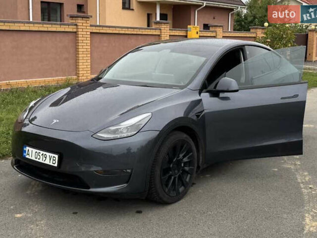 Серый Тесла Model Y, объемом двигателя 0 л и пробегом 57 тыс. км за 31333 $, фото 1 на Automoto.ua