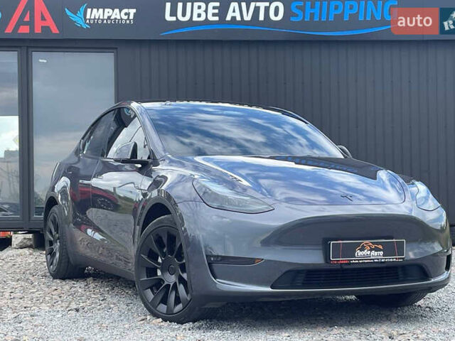 Серый Тесла Model Y, объемом двигателя 0 л и пробегом 41 тыс. км за 27500 $, фото 1 на Automoto.ua
