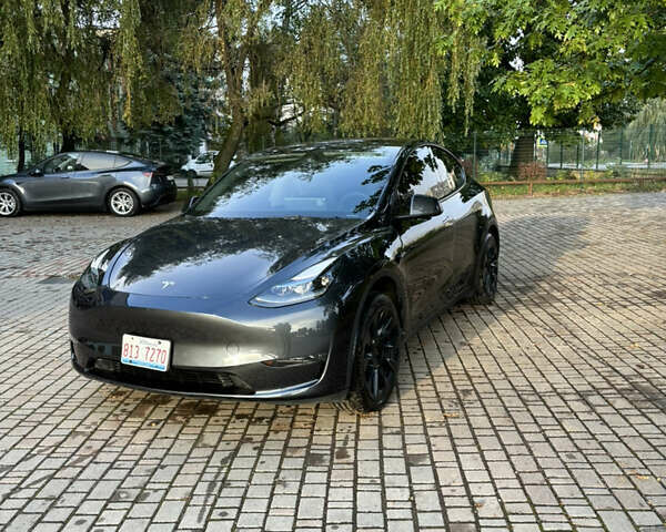 Серый Тесла Model Y, объемом двигателя 0 л и пробегом 30 тыс. км за 23500 $, фото 1 на Automoto.ua