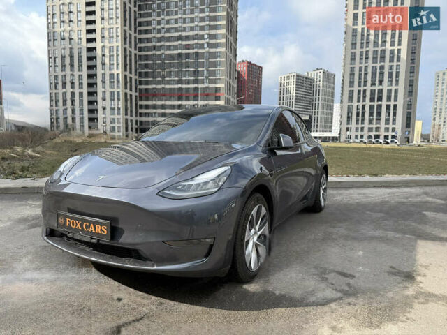 Серый Тесла Model Y, объемом двигателя 0 л и пробегом 31 тыс. км за 26999 $, фото 1 на Automoto.ua