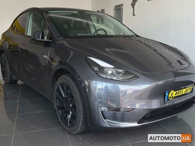 Серый Тесла Model Y, объемом двигателя 82 л и пробегом 13 тыс. км за 35400 $, фото 1 на Automoto.ua