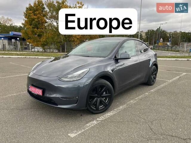 Серый Тесла Model Y, объемом двигателя 0 л и пробегом 51 тыс. км за 28900 $, фото 1 на Automoto.ua