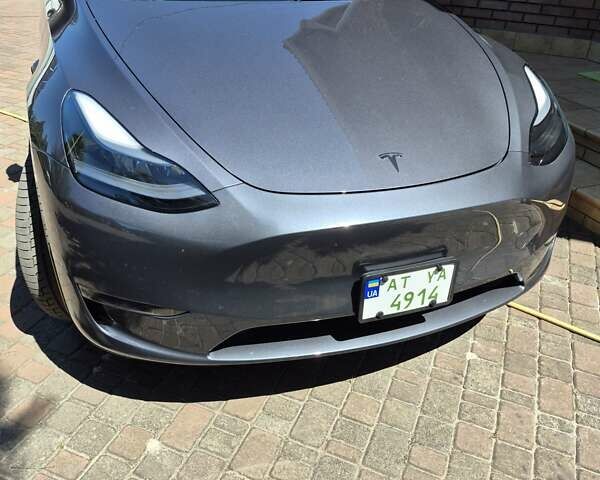 Серый Тесла Model Y, объемом двигателя 0 л и пробегом 24 тыс. км за 29300 $, фото 1 на Automoto.ua