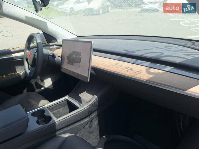 Серый Тесла Model Y, объемом двигателя 0 л и пробегом 29 тыс. км за 27000 $, фото 1 на Automoto.ua