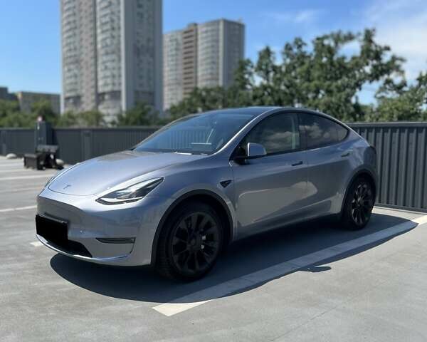 Серый Тесла Model Y, объемом двигателя 0 л и пробегом 11 тыс. км за 48500 $, фото 1 на Automoto.ua