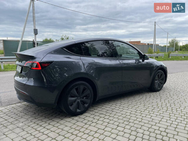 Серый Тесла Model Y, объемом двигателя 0 л и пробегом 19 тыс. км за 33700 $, фото 1 на Automoto.ua