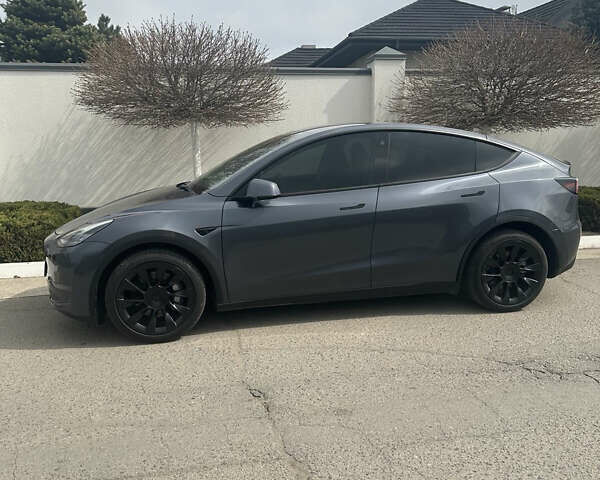 Серый Тесла Model Y, объемом двигателя 0 л и пробегом 11 тыс. км за 28400 $, фото 1 на Automoto.ua