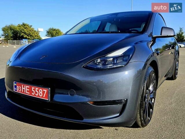 Серый Тесла Model Y, объемом двигателя 0 л и пробегом 29 тыс. км за 27900 $, фото 1 на Automoto.ua