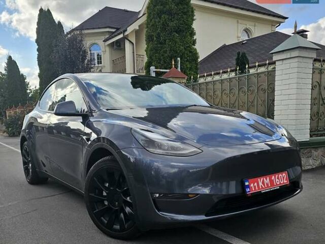 Серый Тесла Model Y, объемом двигателя 0 л и пробегом 38 тыс. км за 27900 $, фото 1 на Automoto.ua