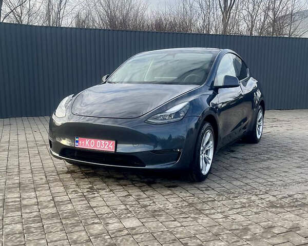 Серый Тесла Model Y, объемом двигателя 0 л и пробегом 20 тыс. км за 25500 $, фото 1 на Automoto.ua