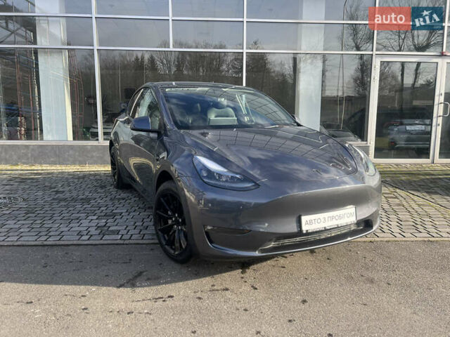 Серый Тесла Model Y, объемом двигателя 0 л и пробегом 2 тыс. км за 26999 $, фото 1 на Automoto.ua
