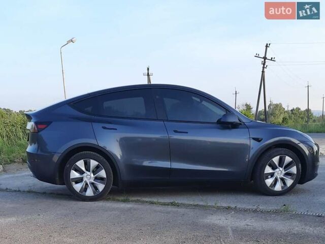 Серый Тесла Model Y, объемом двигателя 0 л и пробегом 41 тыс. км за 27000 $, фото 1 на Automoto.ua
