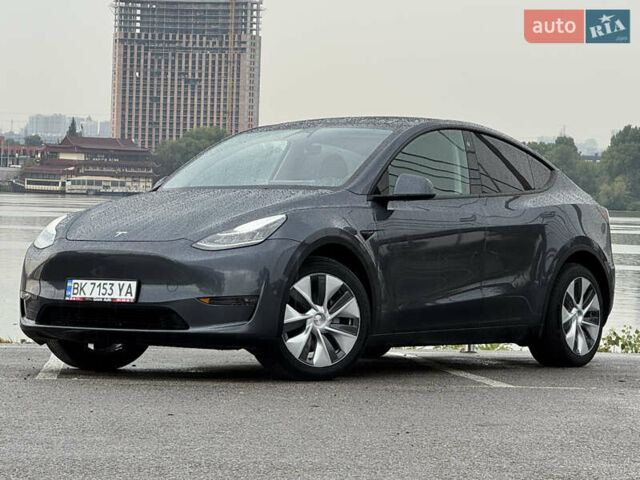 Серый Тесла Model Y, объемом двигателя 0 л и пробегом 66 тыс. км за 27900 $, фото 1 на Automoto.ua