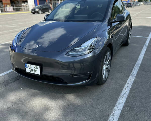 Серый Тесла Model Y, объемом двигателя 0 л и пробегом 9 тыс. км за 28900 $, фото 1 на Automoto.ua