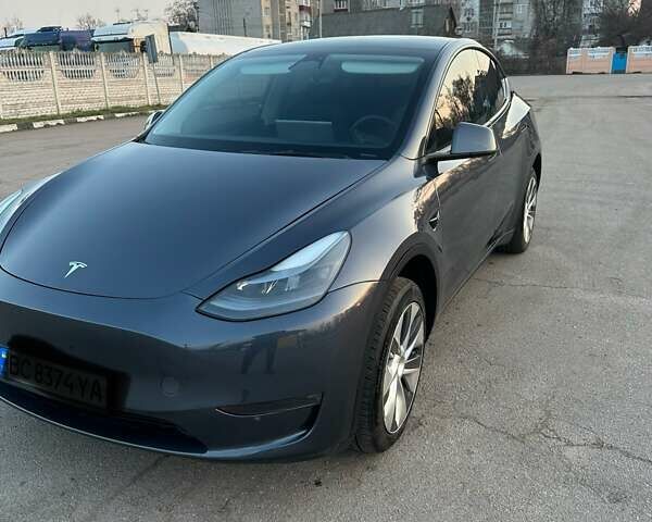 Серый Тесла Model Y, объемом двигателя 0 л и пробегом 65 тыс. км за 26300 $, фото 1 на Automoto.ua