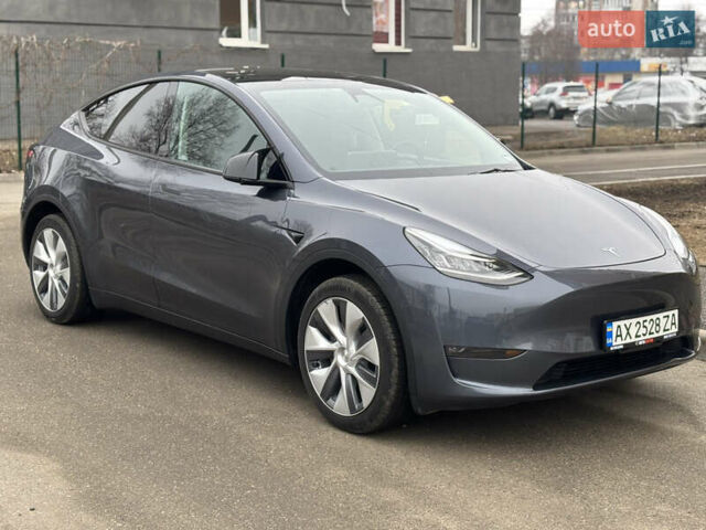 Серый Тесла Model Y, объемом двигателя 0 л и пробегом 20 тыс. км за 27000 $, фото 1 на Automoto.ua