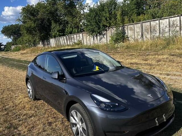 Серый Тесла Model Y, объемом двигателя 0 л и пробегом 31 тыс. км за 26500 $, фото 1 на Automoto.ua