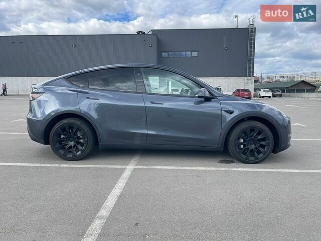 Серый Тесла Model Y, объемом двигателя 0 л и пробегом 156 тыс. км за 21900 $, фото 1 на Automoto.ua
