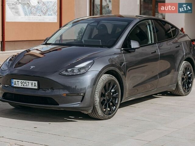 Серый Тесла Model Y, объемом двигателя 0 л и пробегом 55 тыс. км за 31001 $, фото 1 на Automoto.ua