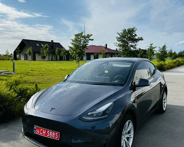 Серый Тесла Model Y, объемом двигателя 0 л и пробегом 19 тыс. км за 25800 $, фото 1 на Automoto.ua