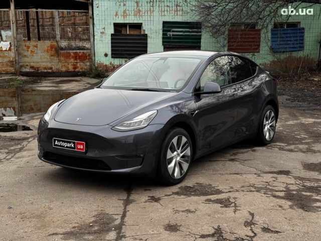 Серый Тесла Model Y, объемом двигателя 0 л и пробегом 22 тыс. км за 25990 $, фото 1 на Automoto.ua