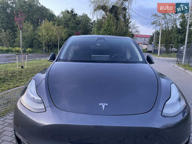 Серый Тесла Model Y, объемом двигателя 0 л и пробегом 107 тыс. км за 27000 $, фото 1 на Automoto.ua