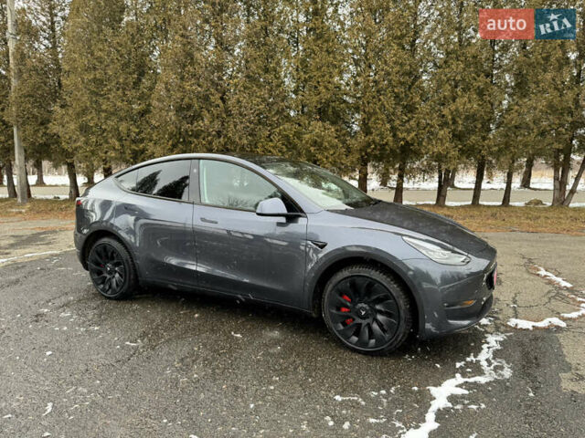 Серый Тесла Model Y, объемом двигателя 0 л и пробегом 28 тыс. км за 28200 $, фото 1 на Automoto.ua