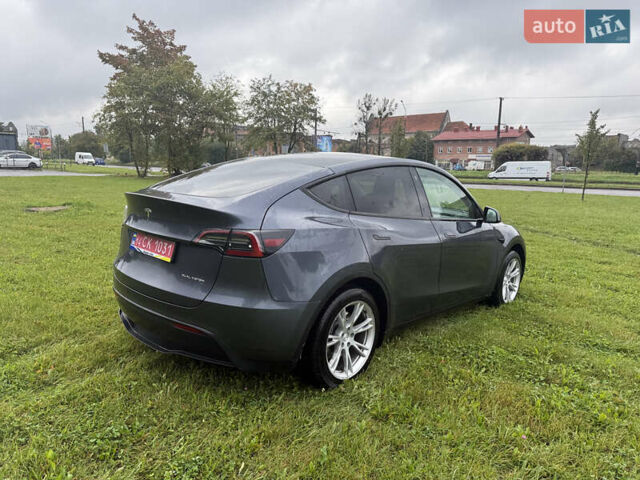 Серый Тесла Model Y, объемом двигателя 0 л и пробегом 44 тыс. км за 26900 $, фото 1 на Automoto.ua