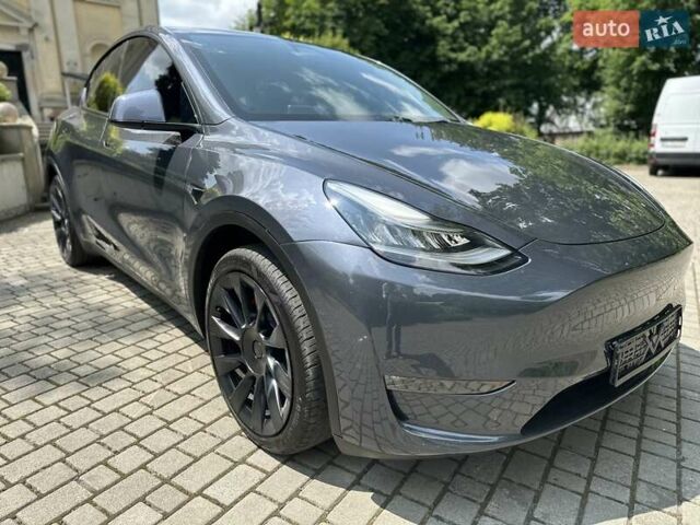 Серый Тесла Model Y, объемом двигателя 0 л и пробегом 55 тыс. км за 25100 $, фото 1 на Automoto.ua