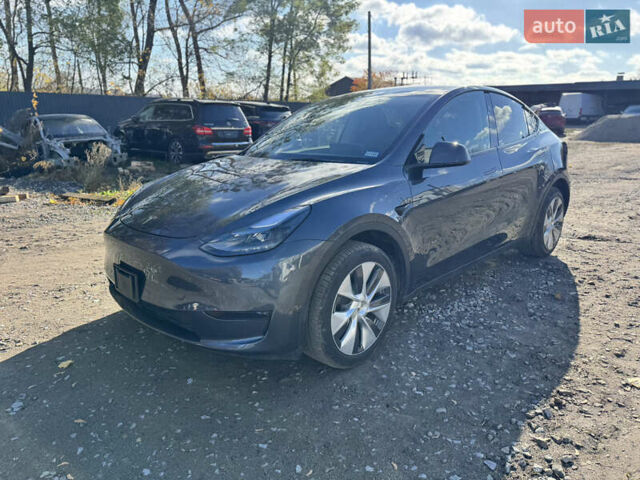 Серый Тесла Model Y, объемом двигателя 0 л и пробегом 22 тыс. км за 21900 $, фото 1 на Automoto.ua