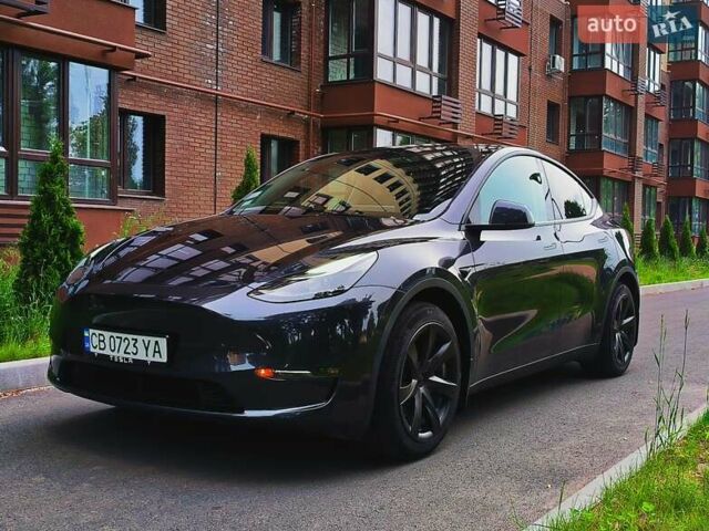 Серый Тесла Model Y, объемом двигателя 0 л и пробегом 15 тыс. км за 34500 $, фото 1 на Automoto.ua