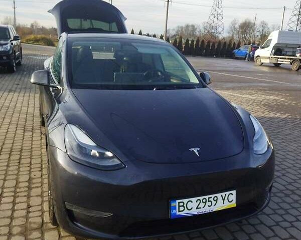 Серый Тесла Model Y, объемом двигателя 0 л и пробегом 12 тыс. км за 30500 $, фото 1 на Automoto.ua