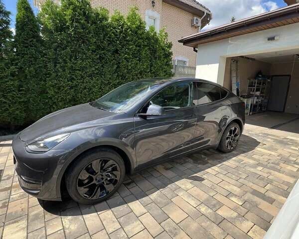 Серый Тесла Model Y, объемом двигателя 0 л и пробегом 13 тыс. км за 31900 $, фото 1 на Automoto.ua