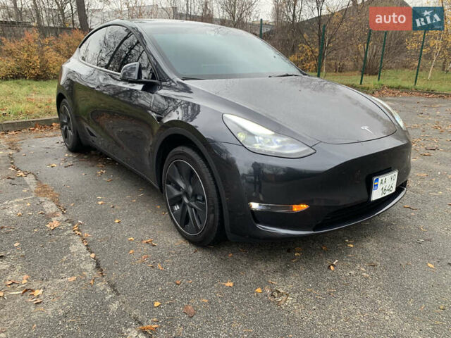 Серый Тесла Model Y, объемом двигателя 0 л и пробегом 35 тыс. км за 32900 $, фото 1 на Automoto.ua