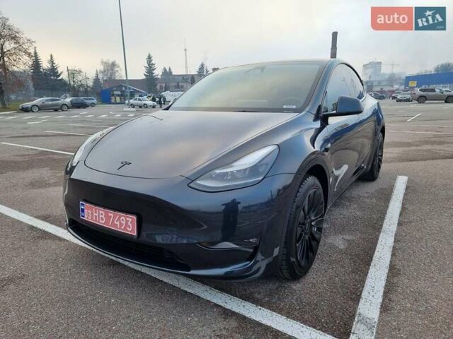 Серый Тесла Model Y, объемом двигателя 0 л и пробегом 24 тыс. км за 30900 $, фото 1 на Automoto.ua