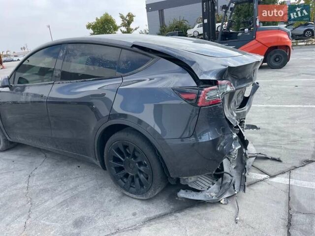 Серый Тесла Model Y, объемом двигателя 0 л и пробегом 36 тыс. км за 17800 $, фото 1 на Automoto.ua