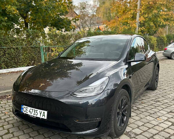 Серый Тесла Model Y, объемом двигателя 0 л и пробегом 26 тыс. км за 31700 $, фото 1 на Automoto.ua