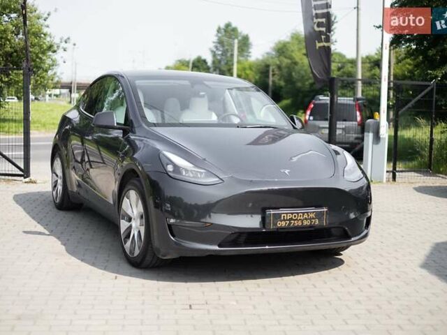 Серый Тесла Model Y, объемом двигателя 0 л и пробегом 24 тыс. км за 29500 $, фото 1 на Automoto.ua