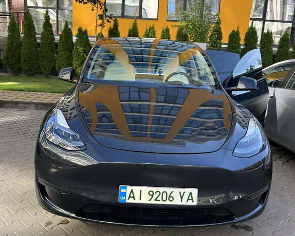Серый Тесла Model Y, объемом двигателя 0 л и пробегом 33 тыс. км за 29000 $, фото 1 на Automoto.ua