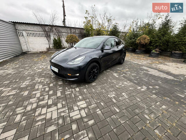 Серый Тесла Model Y, объемом двигателя 0 л и пробегом 8 тыс. км за 31999 $, фото 1 на Automoto.ua