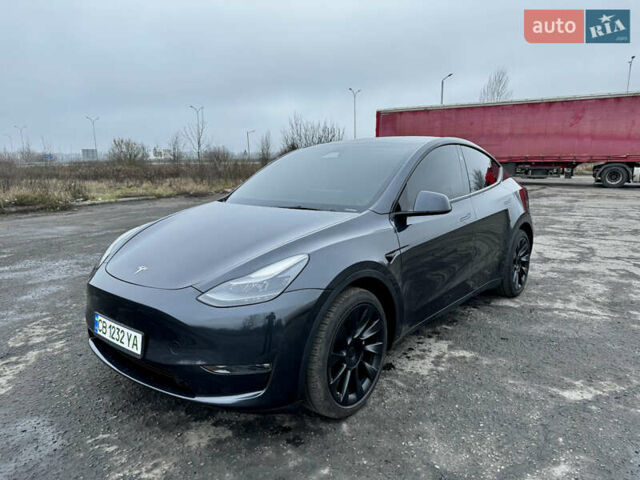 Серый Тесла Model Y, объемом двигателя 0 л и пробегом 22 тыс. км за 27000 $, фото 1 на Automoto.ua