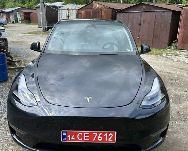 Серый Тесла Model Y, объемом двигателя 0 л и пробегом 12 тыс. км за 28400 $, фото 1 на Automoto.ua