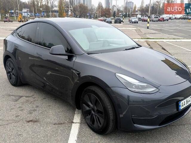 Серый Тесла Model Y, объемом двигателя 0 л и пробегом 13 тыс. км за 29900 $, фото 1 на Automoto.ua