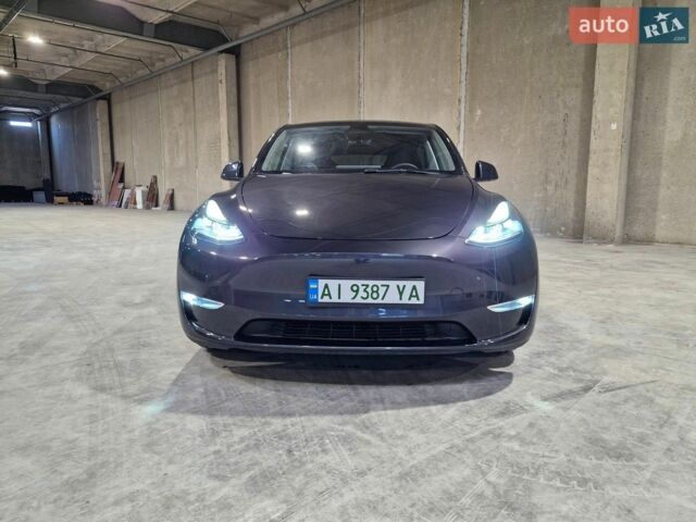 Серый Тесла Model Y, объемом двигателя 0 л и пробегом 18 тыс. км за 32500 $, фото 1 на Automoto.ua