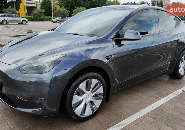 Серый Тесла Model Y, объемом двигателя 0 л и пробегом 11 тыс. км за 30599 $, фото 1 на Automoto.ua