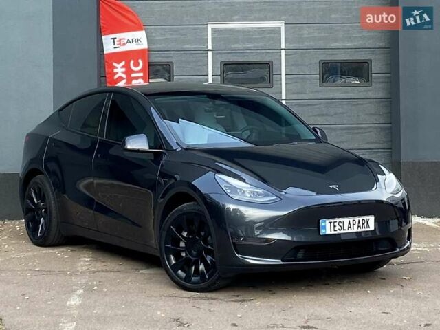 Сірий Тесла Model Y, об'ємом двигуна 0 л та пробігом 23 тис. км за 31999 $, фото 1 на Automoto.ua