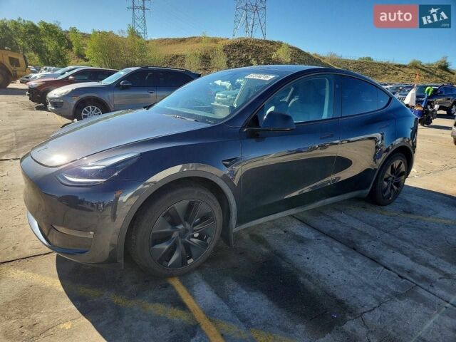 Серый Тесла Model Y, объемом двигателя 0 л и пробегом 14 тыс. км за 12999 $, фото 1 на Automoto.ua