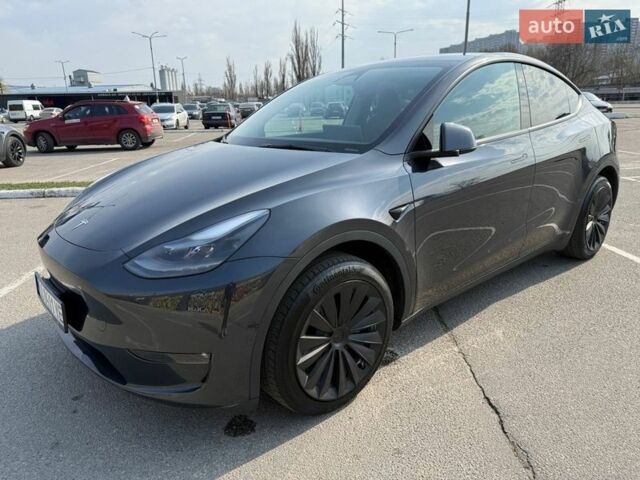 Серый Тесла Model Y, объемом двигателя 0 л и пробегом 57 тыс. км за 29700 $, фото 1 на Automoto.ua
